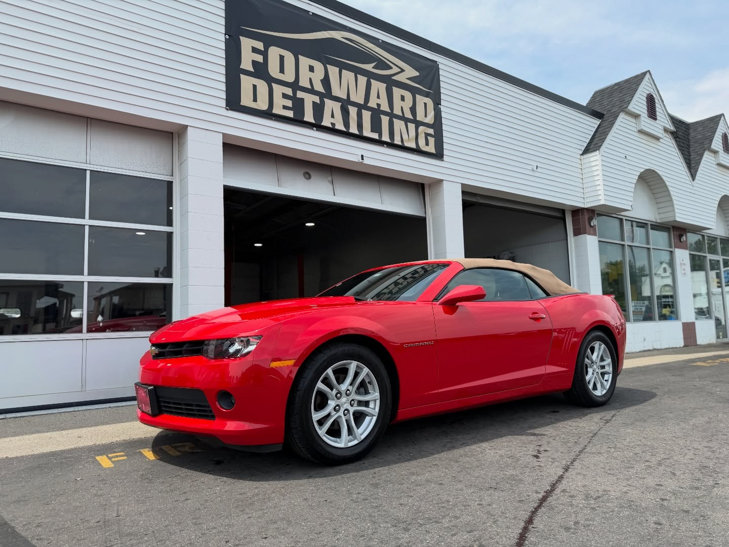 Red Camaro outside Forward Detailing